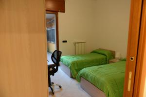 Postel nebo postele na pokoji v ubytování Da Mimì