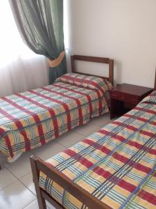 Postelja oz. postelje v sobi nastanitve Apart Antofagasta