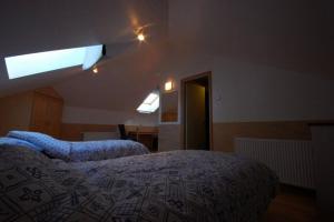 Postel nebo postele na pokoji v ubytování Piibutopsu Holiday House