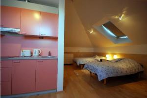 Postel nebo postele na pokoji v ubytování Piibutopsu Holiday House