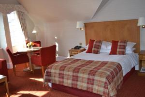 Postel nebo postele na pokoji v ubytování Atholl Hotel