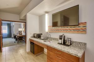 a kitchen with a sink and a counter top at Sebastian Hotel, a member of Radisson Individuals in Saint Augustine