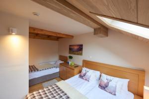 Katil atau katil-katil dalam bilik di LUX privatni apartman 411 u sklopu HOTEL VUČKO JAHORINA