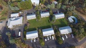 an aerial view of a large building with cars in a parking lot at Hill End Lodge in Hill End