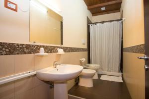 Koupelna v ubytování Cala Blanca Resort