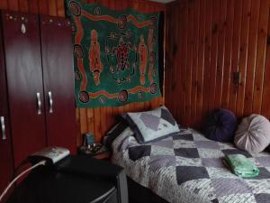 Postel nebo postele na pokoji v ubytování lotus shared-house