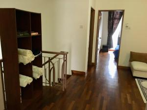 Postel nebo postele na pokoji v ubytování Putrajaya 1808 Homestay