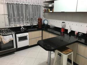 Köök või kööginurk majutusasutuses GA1-Hospedagem Próximo ao Aeroporto de Guarulhos