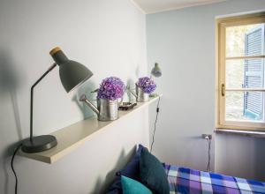 En eller flere senge i et værelse på Casa Dolce Vita + 26 billeder