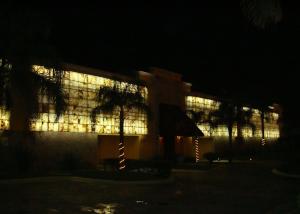 a building lit up at night with lights at Motel Astoria in Aguascalientes