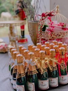 a group of bottles of champagne on a table at 拇指園民宿 in Guanxi