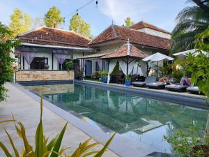The swimming pool at or close to The Sanctuary Villa Battambang