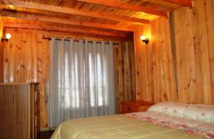 Voodi või voodid majutusasutuse Hostal Doña Tamy toas
