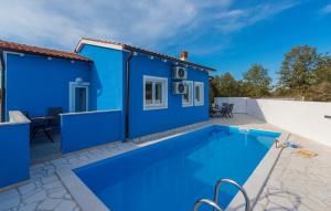 Bazén v ubytování Blue Holiday House with Private Pool nebo v jeho okolí