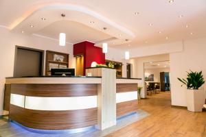 The lobby or reception area at Best Western Hotel Breitbach