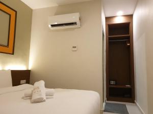 Ants Hotel客房内的一张或多张床位