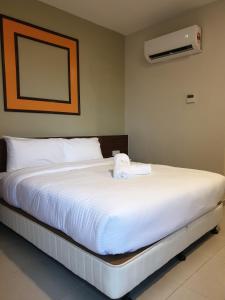 Ants Hotel客房内的一张或多张床位