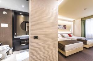 Postel nebo postele na pokoji v ubytování Antony Hotel - Venice Airport
