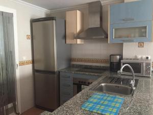 Kuchnia lub aneks kuchenny w obiekcie 2 dorm.A/A.Vista mar.WiFi.Gym.Sauna.Terraza.Parking.