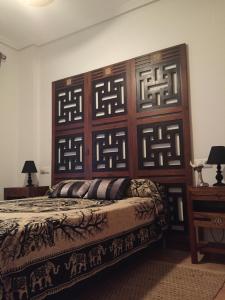 Łóżko lub łóżka w pokoju w obiekcie 2 dorm.A/A.Vista mar.WiFi.Gym.Sauna.Terraza.Parking.