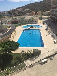 Basen w obiekcie 2 dorm.A/A.Vista mar.WiFi.Gym.Sauna.Terraza.Parking. lub w pobliżu