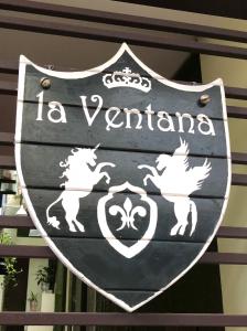 a sign that says la veronica on a building at Ventana house in Hai Phong