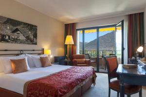 Voodi või voodid majutusasutuse Boutique-HOTEL REMORINO, a Private Selection Hotel toas