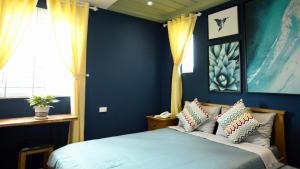 Postel nebo postele na pokoji v ubytování Sleep Box Hostel Phú Quốc