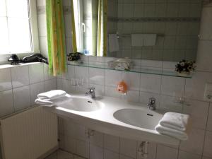 Ванна кімната в Ferienwohnung Moritz