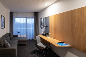 Posezení v ubytování Hotel Olimp Business & Spa