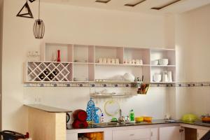 Kuchyň nebo kuchyňský kout v ubytování Purple Place Homestay Phu Quoc