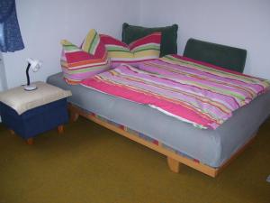 A bed or beds in a room at Log Home