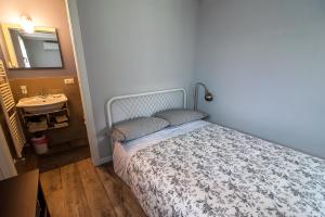 Postel nebo postele na pokoji v ubytování Particolari del Brenta