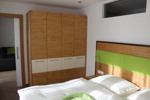 Ένα ή περισσότερα κρεβάτια σε δωμάτιο στο Haus Amade