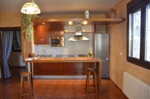 Kuchyň nebo kuchyňský kout v ubytování Casa Rural Alada
