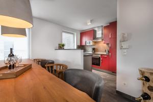 Kuchyň nebo kuchyňský kout v ubytování AlpenParks Residence Bad Hofgastein - gratis Thermeneintritt