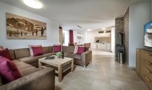 Posezení v ubytování AlpenParks Residence Bad Hofgastein - gratis Thermeneintritt