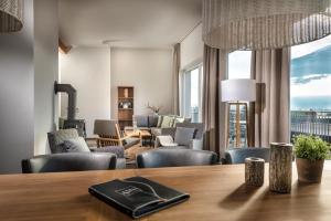 Posezení v ubytování AlpenParks Residence Bad Hofgastein - gratis Thermeneintritt + 29 fotografií