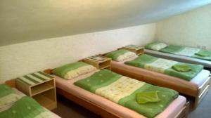 Posteľ alebo postele v izbe v ubytovaní Guest House Honzik