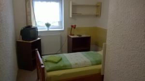 Posteľ alebo postele v izbe v ubytovaní Guest House Honzik