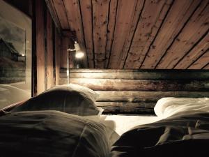 Postel nebo postele na pokoji v ubytování RUKA Saaruanaho F1 93 m2