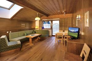 A television and/or entertainment centre at Appartement Kathi Scheiber