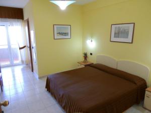 Postel nebo postele na pokoji v ubytování B&B Angela