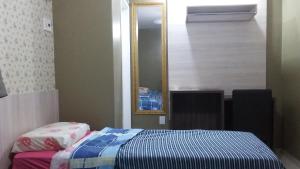Katil atau katil-katil dalam bilik di Juazeiro Residence Hotel