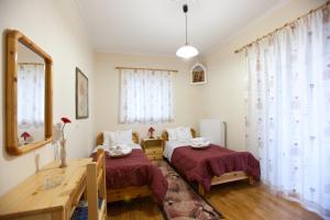 Postel nebo postele na pokoji v ubytování Villa PANORAMA