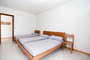 Ένα ή περισσότερα κρεβάτια σε δωμάτιο στο Sanian