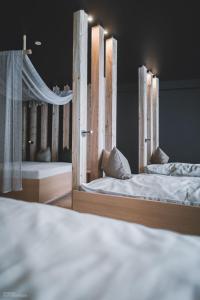 Posteľ alebo postele v izbe v ubytovaní Stoana Residence & Wellness