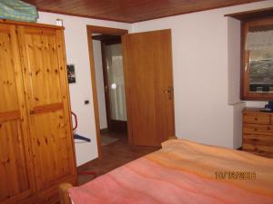 Ένα ή περισσότερα κρεβάτια σε δωμάτιο στο Rustica Olga Frazione Rivoria 11.bis
