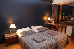 Ένα ή περισσότερα κρεβάτια σε δωμάτιο στο All Ice Lapland Chalets I