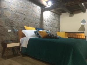 Ein Bett oder Betten in einem Zimmer der Unterkunft Le Carezze home